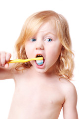 child with toothbrush