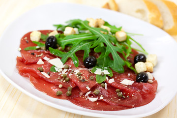 Carpaccio mit Parmesan,Rucola
