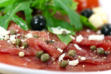 Carpaccio mit Parmesan,Rucola