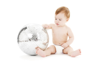 adorable baby boy with big disco ball