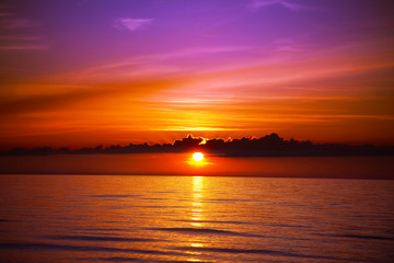 Naklejka na ściany i meble beautiful sunset on the beach