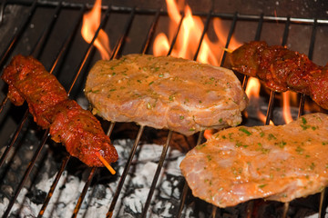 Steak, skewer and fire