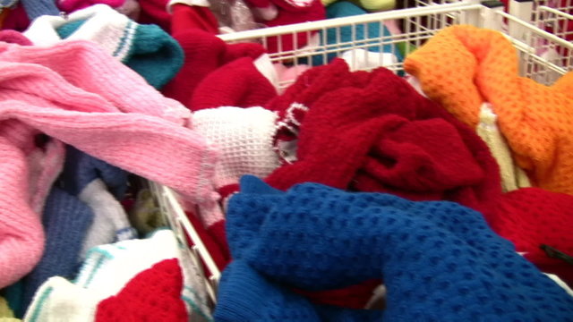 baby clothes in shop panning