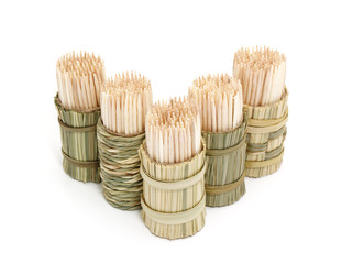 a round bamboo box of toothpicks