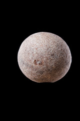 round stone on the black