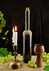 Obraz premium Old wine and grapes