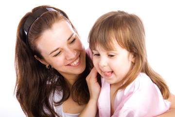 Adorable little girl with her mother