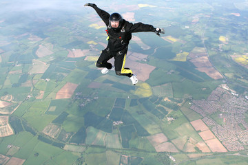 Skydiver in a sit position while in freefall