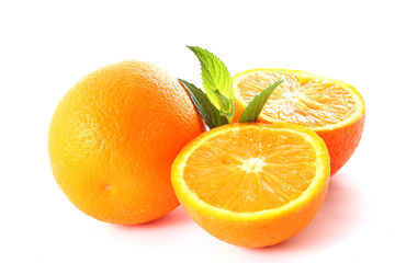 Fototapeta na wymiar oranges and leaves of mint