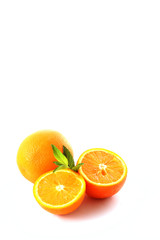 Fototapeta na wymiar oranges and leaves of mint