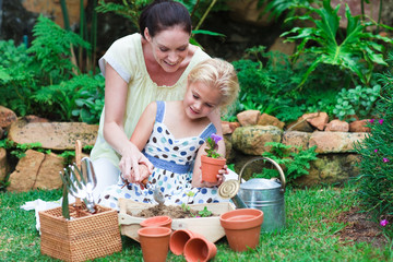 Mother and daughter gardening