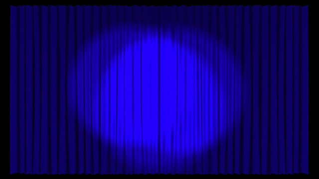 Spots of light in a theatre blue curtain
