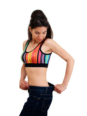 Slim lady trying on jeans after diet, looking back