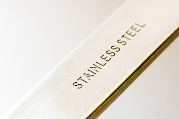 Stainless steel bar with engravings
