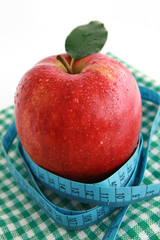 On diet - apple and tape measure