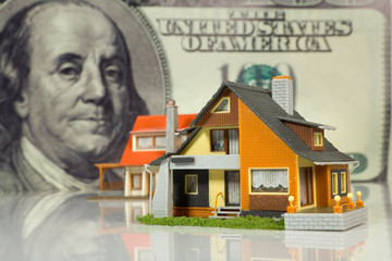 Real Estate concept  on big dollar background - 14345515