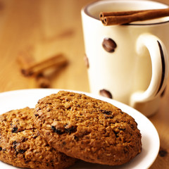 Cookies and coffee with cinnamon