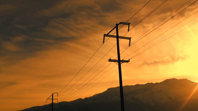 Electrical poles at sunset time lapse - HD