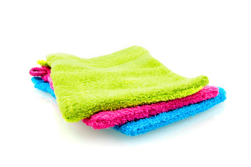 Colorful washclothes isolated on white background