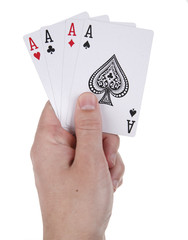 Four aces in a hand  isolated on white