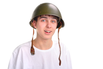 teenager in a military helmet