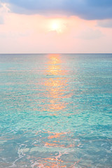 Turquoise ocean in sunrise at tropical island