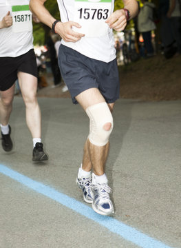 Injured runner in a competition