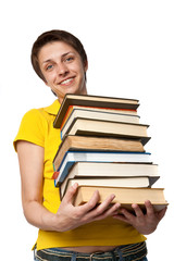 The happy girl the student with a pile of books
