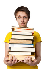 The surprised girl the student with a pile of books