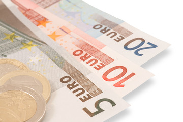 Euro's banknotes and coins on white background with shadows