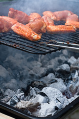 Marinated chiken on barbecue stand