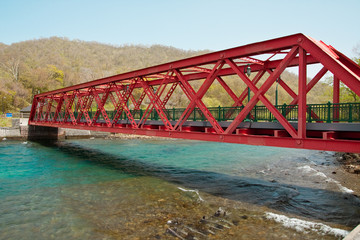 Fototapeta na wymiar Red steel bridge