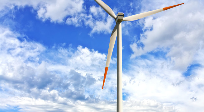 Wind generator on blue sky