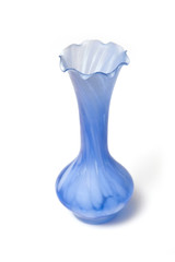 Blue glass vase isolated on a white background.