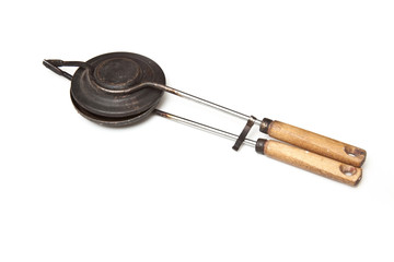 waffle iron isolated on a white studio background.