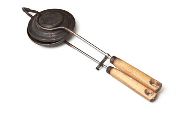 waffle iron isolated on a white studio background.