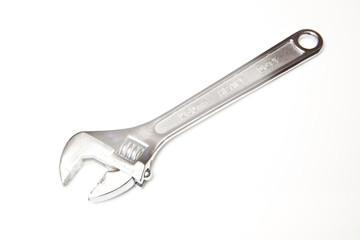 adjustable spanner isolated on a white studio background.