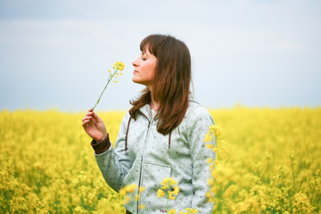 Beauty woman in flower field