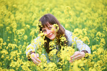 Beauty woman in flower field