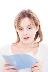 Portrait of young happy woman reading valentine card
