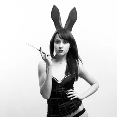 Fotobehang Young seductive woman with rabbit ears © Egor Mayer