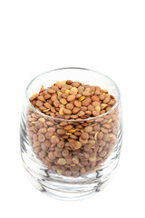 lentils in glass, white background