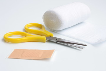 Stretch and adhesive bandage