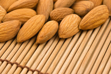 almonds on a bamboo mat
