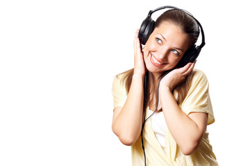 Fototapeta premium Young woman teenager listening music with headphones