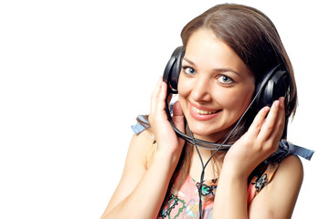 Young woman teenager listening music with headphones