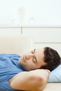 Man sleeping on couch