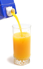 orange juice in packing and glass