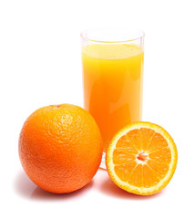 orange and juice in glass