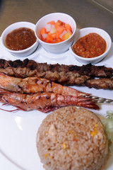 Fried rice eastern cuisine with sate and seafood